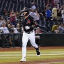 Christia Walker, de los Diamondbacks de Arizona, recorre las bases luego de conectar un jonrón en el juego del miércoles 31 de mayo de 2023, ante los Rockies de Colorado (AP Foto/Ross D. Franklin)