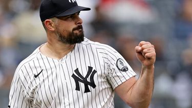 El abridor Carlos Rodón de los Yankees de Nueva York reacciona tras sacar el último out en el séptimo inning ante los Rays de Tampa Bay, el martes 22 de septiembre de 2026, en Nueva York. (AP Foto/Adam Hunger)