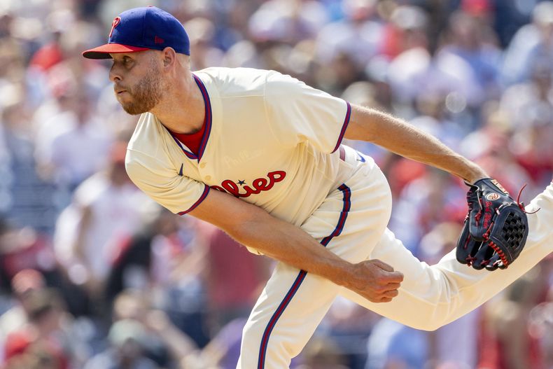Zack Wheeler, abridor de los Filis de Filadelfia, hace un lanzamiento en el juego del sábado 22 de junio de 2024, ante los Diamondbacks de Arizona (AP Foto/Laurence Kesterson)