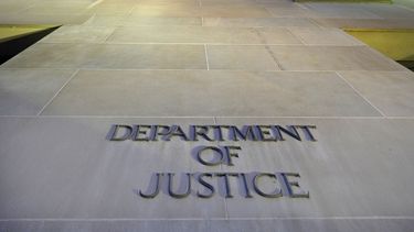 La sede del Departamento de Justicia de Estados Unidos en Washington el 14 de mayo del 2013. (AP foto/J. David Ake)