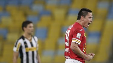 americateve | Gustavo Canales, de Uni&oacute;n Espa&ntilde;ola de Chile, celebra luego de anotar frente a Botafogo de Brasil durante un encuentro de la Copa Libertadores, disputado el mi&eacute;rcoles 2 de abril de 2014 en R&iacute;o de Janeiro (AP Foto/Felipe Dana)