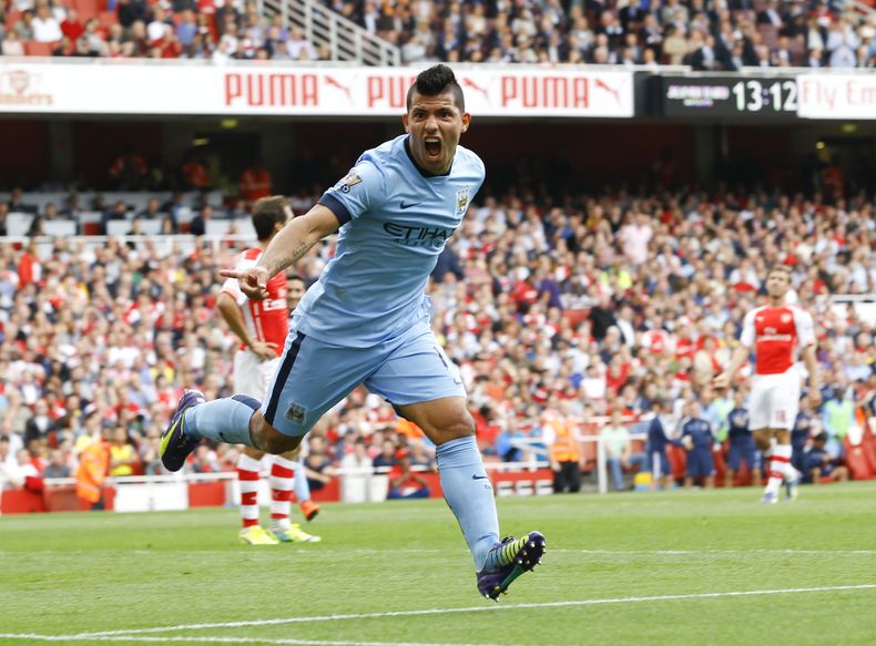 El jugador de Manchester City, Sergio Ag&uuml;ero, festeja un gol contra Arsenal en la liga Premier el s&aacute;bado, 13 de septiembre de 2014, en Londres. (AP Photo/Kirsty Wigglesworth)