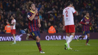 americateve | Carles Puyol, del Barcelona, celebra tras anotar contra el Almer&iacute;a durante un partido de la liga espa&ntilde;ola en el Camp Nou, en Barcelona, Espa&ntilde;a, el lunes 2 de marzo de 2014. Puyol anunci&oacute; el martes 4 de marzo de 2014 que dejar&a