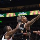 Hawks se sostienen al final para vencer al Heat