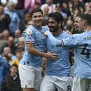 Ilkay Gundogan del Manchester City celebra con sus compañeros tras anotar el segundo gol de su equipo en el encuentro ante el Leeds en la Liga Premier el sábado 6 de mayo del 2023. (AP Foto/Rui Vieira)