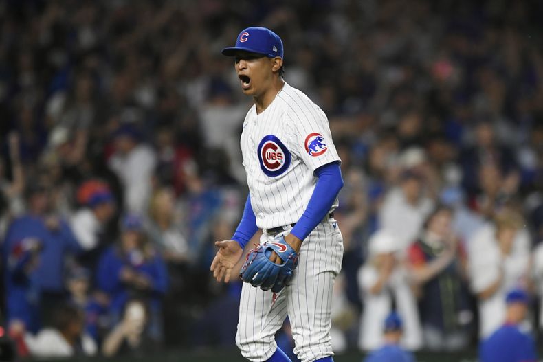 El venezolano Adbert Alzolay, cerrador de los Cachorros de Chicago, celebra el final del duelo ante los Rays de Tampa Bay, el martes 30 de mayo de 2023 (AP Foto/Paul Beaty)