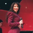 ARCHIVO - La cantante tejana Selena Quintanilla actúa en el Astrodome durante el Houston Livestock Show and Rodeo el 26 de febrero de 1995. (John Everett/Houston Chronicle via AP)
