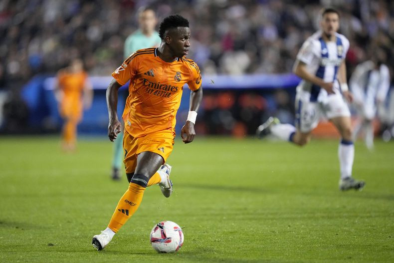 El atacante del Real Madrid Vinicius Junior durante el partido contra Leganés en la Liga española, el domingo 24 de noviembre de 2024. (AP Foto/Bernat Armangue)