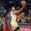 Curry aporta 33 puntos; Warriors doblegan a Heat