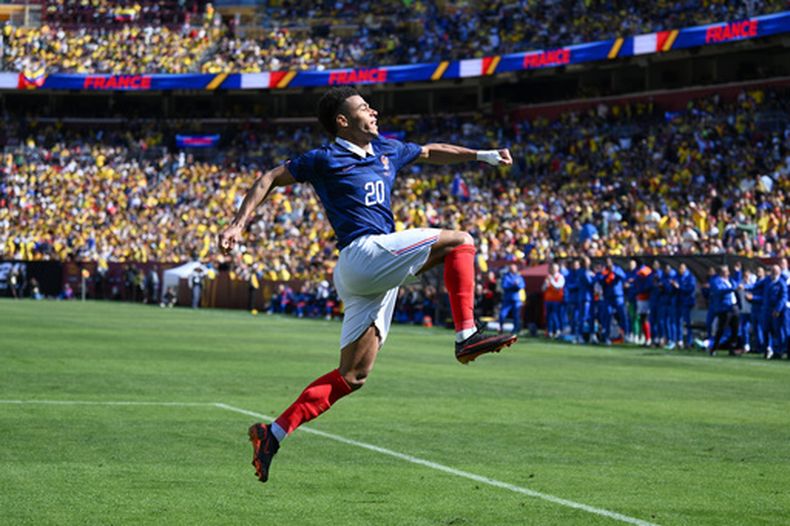 Désiré Doué (20), delantero de Francia, celebra tras marcar el primer gol de su equipo en el partido de fútbol amistoso entre Colombia y Francia disputado el domingo 29 de marzo de 2026, en Landover, Maryland. (AP Foto/Nick Wass)