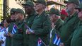 El presidente cubano Miguel Díaz-Canel, en el centro, asiste a una celebración conmemorativa del 65 aniversario de la proclamación que declara socialista a la revolución cubana, en La Habana, Cuba, el jueves 16 de abril de 2026. (AP Foto/Ramón Espinosa)