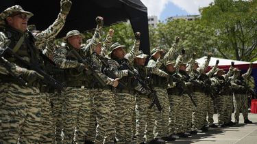 Miembros de la Milicia Nacional Bolivariana vitorean al unísono durante ejercicios militares en Caracas, Venezuela, el sábado 20 de septiembre de 2025. (Foto AP/Ariana Cubillos)