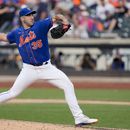 El abridor de los Mets de Nueva York Justin Verlander lanza en la séptima entrada del juego ante los Gigantes de San Francisco el sábado 1 de julio del 2023. (AP Foto/John Minchillo)