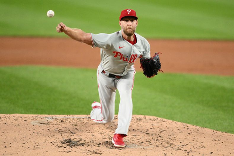 Zack Wheeler, de los Filis de Filadelfia, lanza durante la segunda entrada del juego de béisbol de Grandes Ligas ante los Nacionales de Washington, el miércoles 16 de septiembre de 2026, en Washington. (AP Foto/Nick Wass)