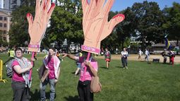 Manifestantes antes de una marcha hacia la Convención Nacional Demócrata, el lunes 19 de agosto de 2024, en Chicago. (AP Foto/Frank Franklin II)