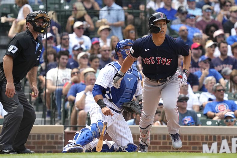 Masataka Yoshida de los Medias Rojas de Boston tras batear un grand slam ante los Cachorros de Chicago, el domingo 16 de julio de 2023. (AP Foto/Nam Y. Huh)
