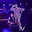 El cantante de rap puertorriqueño Anuel AA se presenta en el festival de música en Caracas, Venezuela, el domingo 19 de marzo de 2023. (Foto AP/Matias Delacroix)