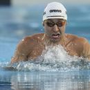 Miguel de Lara, de México, compite en los 200 metros pecho en los Juegos Centroamericanos y del Caribe de San Salvador, el jueves 29 de junio de 2023 (AP Foto/Arnulfo Franco)