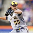 Burnes y Adames guían a Cerveceros, que apalean a Mets
