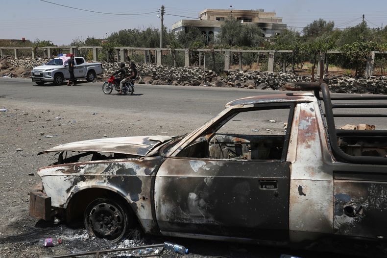 La escena después de la violencia en la aldea de Mazraa, en las afueras de la ciudad de Sweida, Siria, el 20 de julio del 2025. (AP foto/Omar Sanadiki)