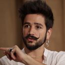 ARCHIVO - El cantante colombiano Camilo habla durante una entrevista en Sony Music Latin en Miami el 16 de septiembre de 2019. (Foto AP/Lynne Sladky, archivo)