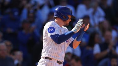 Ian Happ de los Cachorros de Chicago celebra trasn anotar una carrera ante los Marlins de Miami, el jueves 24 de septiembre de 2026, en Chicago. (AP Foto/Melissa Tamez)