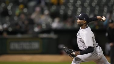 El dominicano de los Yanquis de Nueva York Domingo Germán lanza en la séptima entrada del juego ante los Atléticos de Oakland el miércoles 28 de junio del 2023. (AP Foto/Godofredo A. Vásquez)