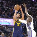Curry anota 33 puntos y Warriors vencen a Kings