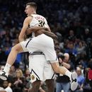 Nuggets derrotan a Mavericks con tiro de último momento