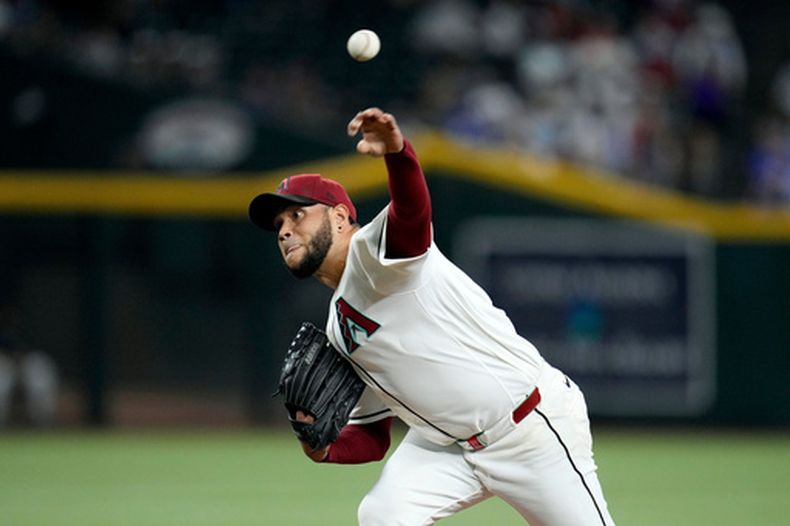 El venezolano Eduardo Rodríguez, de los Diamondbacks de Arizona, lanza ante los Cachorros de Chicago el miércoles 26 de agosto de 2026 (AP Foto/Ross D. Franklin)