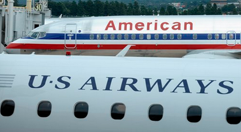 El Departamento de Justicia aprueba fusión entre American Airlines y US Airways.