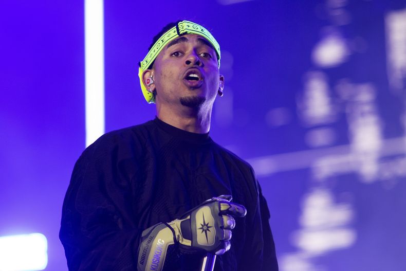 El cantante puertorriqueño Ozuna durante su concierto en el Coca-Cola Flow Fest de la Ciudad de México el domingo 26 de noviembre de 2023. (Foto AP/Alejandro Godínez)