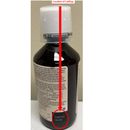 La foto distribuida por la Administración de Alimentos y Medicamentos (FDA) muestra la ubicación del número de lote del jarabe para la tos Robitussin retirado de la venta el jueves 25 de enero de 2024. El retiro se debe a una posible contaminación que podría causar trastornos graves a personas con el sistema inmunitario debilitado. (U.S. Food & Drug Administration via AP)