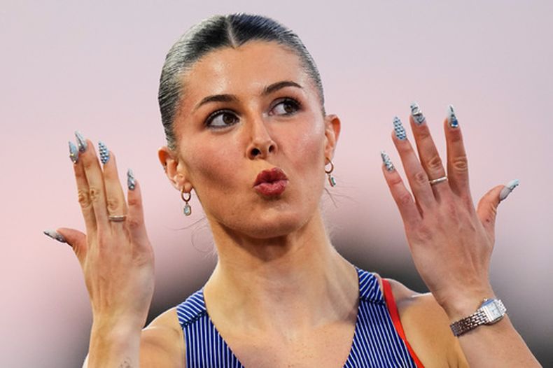 La británica Amy Hunt reacciona tras su semifinal femenina de 200 metros en los Campeonatos Europeos de Atletismo en Birmingham, Inglaterra, el miércoles 12 de agosto de 2026. (Foto AP/Petr David Josek)