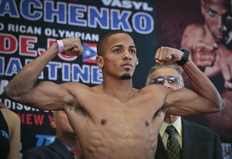 ARCHIVO - El boxeador puertorriqueño Félix Verdejo posa tras el pesaje en el Madison Square Garden de Nueva York, el 10 de junio de 2016 (AP Photo/Bebeto Matthews, File)
