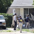 Oficiales del FBI investigan la escena donde hubo un tiroteo en Provo, Utah, el 9 de agosto de 2023. Agentes del FBI mataron a tiros el miércoles a un hombre de Utah acusado de proferir amenazas contra el presidente Joe Biden. (Laura Seitz/The Deseret News vía AP)