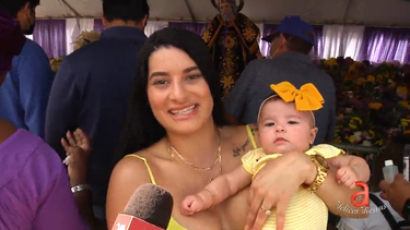 con flores y velas cubanos visitan el rincon de san lazaro en hialeah