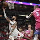Con 28 puntos de Lowry, Heat supera por 113-105 a Wizards