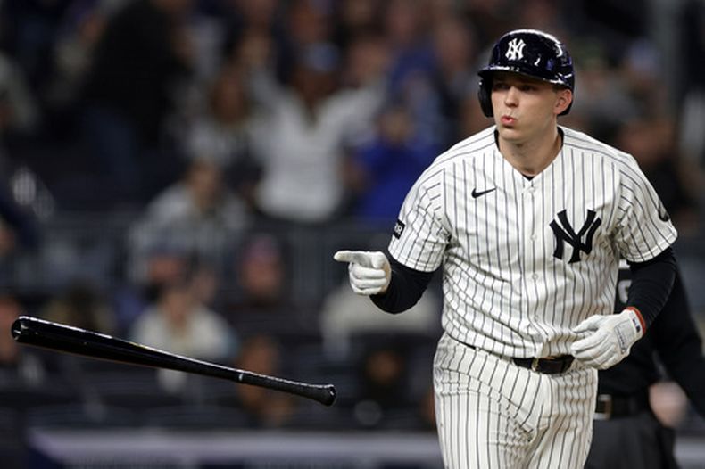 Ben Rice de los Yankees de Nueva York reacciona a su jonrón solitario para abrir el juego ante los Rays de Tampa Bay el miércoles 23 de septiembre del 2026. (AP Foto/Adam Hunger)
