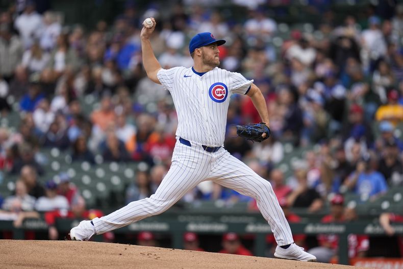 El abridor de los Cachorros Jameson Taillon lanza en la primera entrada ante los Rojos de Cincinnati el viernes 27 de septiembre del 2024. (AP Foto/Erin Hooley)